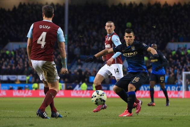 Sergio Kun Aguero of Manchester City strikes at goal - Burnley vs. Manchester City - Barclay s Premier League - Turf Moor - Burnley - 14 03 2015 Pic Philip Oldham Sportimage EDITORIAL USE ONLY. No use with unauthorised audio, video, data, fixture lists, club league logos or live services. Online in-match use limited to 120 images, no video emulation. No use in betting, games or single club league player publications.
