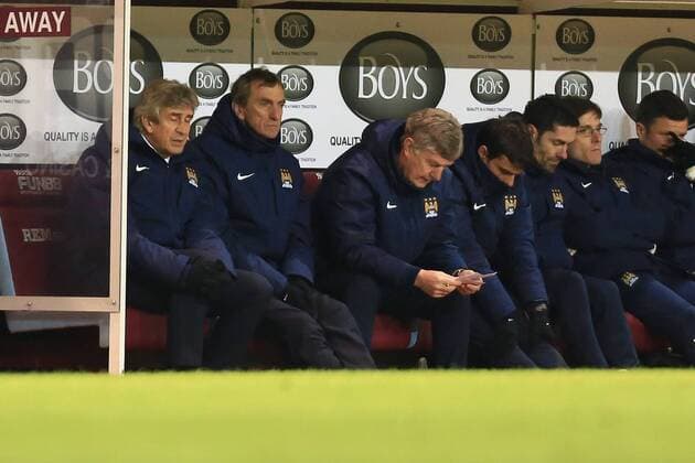 The City bench look defeated - Burnley vs. Manchester City - Barclay s Premier League - Turf Moor - Burnley - 14 03 2015 Pic Philip Oldham Sportimage EDITORIAL USE ONLY. No use with unauthorised audio, video, data, fixture lists, club league logos or live services. Online in-match use limited to 120 images, no video emulation. No use in betting, games or single club league player publications.