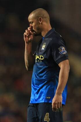 Vincent Kompany of Manchester City looks dejected - Burnley vs. Manchester City - Barclay s Premier League - Turf Moor - Burnley - 14 03 2015 Pic Philip Oldham Sportimage EDITORIAL USE ONLY. No use with unauthorised audio, video, data, fixture lists, club league logos or live services. Online in-match use limited to 120 images, no video emulation. No use in betting, games or single club league player publications.
