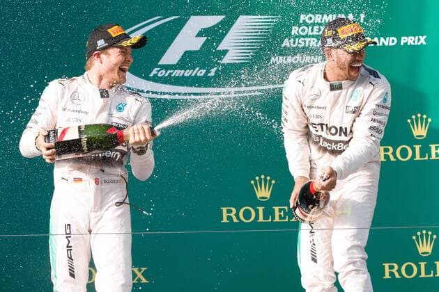 March 15, 2015: Lewis Hamilton (GBR) 44 (1st) and Nico Rosberg (DEU) 6 (2nd) spray champagne on the podium at the 2015 Australian Formula One Grand Prix at Albert Park, Melbourne, Australia. Sydney Low Cal Media Formula One 2015: Australia MAR 15 - ZUMAc04_