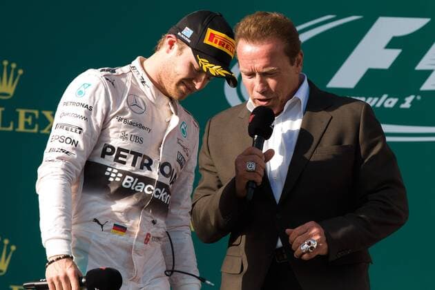 March 15, 2015: Arnold Schwarzenegger congratulates Nico Rosberg (DEU) 6 (2nd) on the podium at the 2015 Australian Formula One Grand Prix at Albert Park, Melbourne, Australia. Sydney Low Cal Media Formula One 2015: Australia MAR 15 - ZUMAc04_