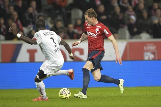 Nolan ROUX (lille) vs MBENGUE Cheikh (Rennes) FOOTBALL : Losc vs Rennes - Ligue 1 - 15 03 2015 JBAutissier Panoramic 