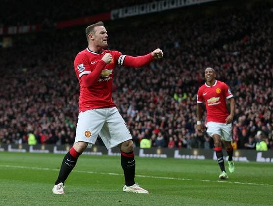 Wayne Rooney of Manchester United ManU celebrates scoring the third goal with a reference to a story that he had been knocked out in his kitchen while play boxing - Barclays Premier League - Manchester Utd vs Tottenham - Old Trafford Stadium - Manchester - England - 15th March 2015 - Picture Simon Bellis Sportimage EDITORIAL USE ONLY. No use with unauthorised audio, video, data, fixture lists, club league logos or live services. Online in-match use limited to 120 images, no video emulation. No use in betting, games or single club league player publications.