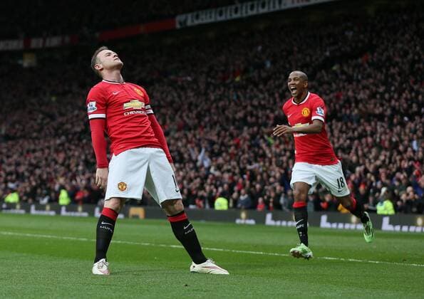 Wayne Rooney of Manchester United ManU celebrates scoring the third goal with a reference to a story that he had been knocked out in his kitchen while play boxing - Barclays Premier League - Manchester Utd vs Tottenham - Old Trafford Stadium - Manchester - England - 15th March 2015 - Picture Simon Bellis Sportimage EDITORIAL USE ONLY. No use with unauthorised audio, video, data, fixture lists, club league logos or live services. Online in-match use limited to 120 images, no video emulation. No use in betting, games or single club league player publications.