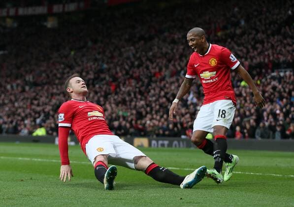 Wayne Rooney of Manchester United ManU celebrates scoring the third goal with a reference to a story that he had been knocked out in his kitchen while play boxing - Barclays Premier League - Manchester Utd vs Tottenham - Old Trafford Stadium - Manchester - England - 15th March 2015 - Picture Simon Bellis Sportimage EDITORIAL USE ONLY. No use with unauthorised audio, video, data, fixture lists, club league logos or live services. Online in-match use limited to 120 images, no video emulation. No use in betting, games or single club league player publications.