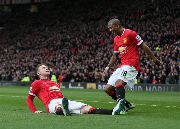 Wayne Rooney of Manchester United ManU celebrates scoring the third goal with a reference to a story that he had been knocked out in his kitchen while play boxing - Barclays Premier League - Manchester Utd vs Tottenham - Old Trafford Stadium - Manchester - England - 15th March 2015 - Picture Simon Bellis Sportimage EDITORIAL USE ONLY. No use with unauthorised audio, video, data, fixture lists, club league logos or live services. Online in-match use limited to 120 images, no video emulation. No use in betting, games or single club league player publications.