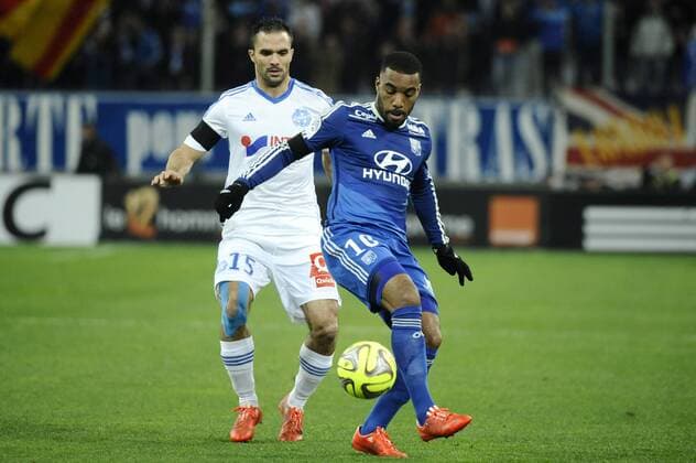 Morel (OM) - Lacazette (OL) FOOTBALL : Marseille vs Lyon - Ligue 1 - 15 02 2015 FranckPennant Panoramic 