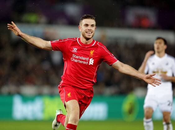 Jordan Henderson of Liverpool celebrates scoring the first goal - Barclays Premier League - Swansea City vs Liverpool - Liberty Stadium - Swansea - Wales - 16th March 2015 - Picture Simon Bellis Sportimage EDITORIAL USE ONLY. No use with unauthorised audio, video, data, fixture lists, club league logos or live services. Online in-match use limited to 120 images, no video emulation. No use in betting, games or single club league player publications.