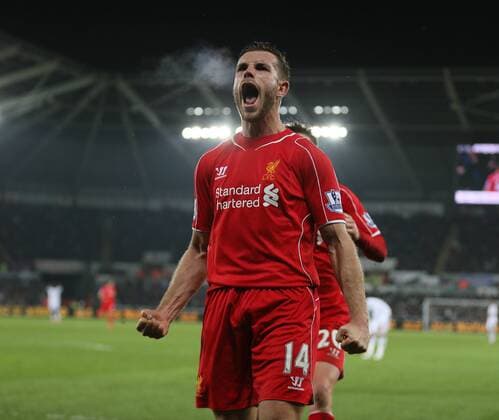 Jordan Henderson of Liverpool celebrates scoring the first goal - Barclays Premier League - Swansea City vs Liverpool - Liberty Stadium - Swansea - Wales - 16th March 2015 - Picture Simon Bellis Sportimage EDITORIAL USE ONLY. No use with unauthorised audio, video, data, fixture lists, club league logos or live services. Online in-match use limited to 120 images, no video emulation. No use in betting, games or single club league player publications.
