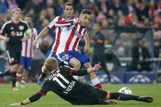 Atletico de Madrid s Jose Maria Gimenez (t) and Bayer 04 Leverkusen s Stefan Kiessling during Champions League 2014 2015 match.March 17,2015.  (20150301755)