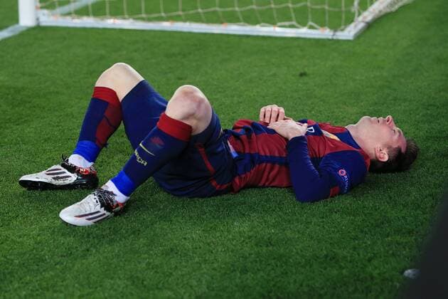 Lionel Messi of Barcelona lies down dejected - Barcelona vs. Manchester City - UEFA Champion s League - Round of 16, second leg - Nou Camp - Barcelona - 18 03 2015 Pic Philip Oldham Sportimage EDITORIAL USE ONLY. No use with unauthorised audio, video, data, fixture lists, club league logos or live services. Online in-match use limited to 120 images, no video emulation. No use in betting, games or single club league player publications.