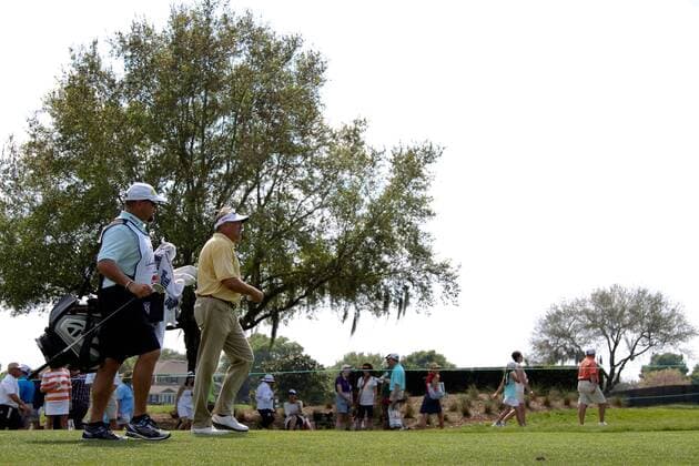 March 20, 2015 - Orlando, Florida, United States - Kenny Duke (R) and his caddie walk off the 7th tee during the second round of the Arnold Palmer Invitational presented by MasterCard at Bay Hill Club & Lodge. PGA Golf Herren 2015 - Arnold Palmer Invitational Presented by MasterCard - Second Round - ZUMAw109