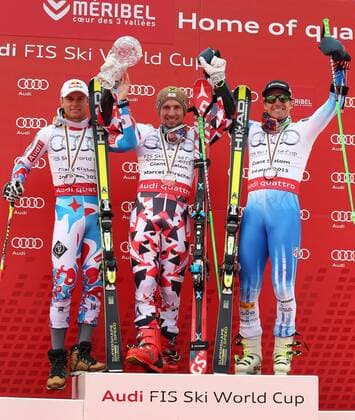 ALPINE SKIING - FIS WC Meribel MERIBEL,FRANCE,21.MAR.15 - ALPINE SKIING - FIS World Cup Final, giant slalom, men, award ceremony for the Giant Slalom World Cup. Image shows Alexis Pinturault (FRA), Marcel Hirscher (AUT) and Ted Ligety (USA). Keywords: crystal globe, trophy, medal.