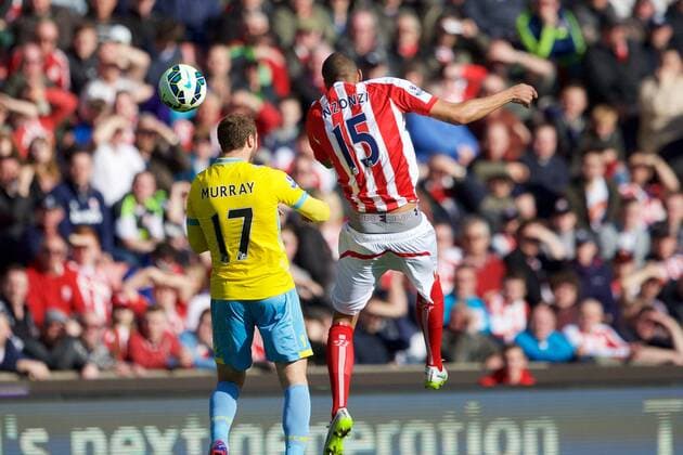 21.03.2015. Stoke, England. Barclays Premier League. Stoke City versus Crystal Palace. Stoke City midfielder Steven N Zonzi and Crystal Palace forward Glenn Murray battle for the high ball. xTimxWilliamsx  ActionPlus11606930