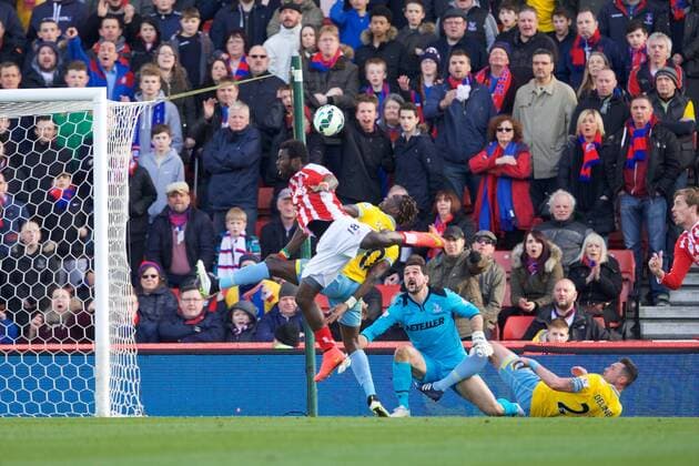21.03.2015. Stoke, England. Barclays Premier League. Stoke City versus Crystal Palace. Stoke City forward Mame Biram Diouf with the header to keep out the Palace pressure xTimxWilliamsx  ActionPlus11606957