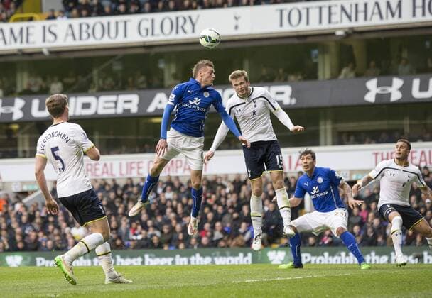 21.03.2015. London, England. Barclays Premier League. Tottenham Hotspur versus Leicester. Leicester City s Jamie Vardy looks to win the header against Tottenham Hotspur s Eric Dier. xNigelxCookex  ActionPlus11606991