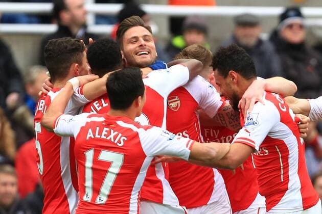 Arsenal s Olivier Giroud is congratulated on his opening goal - Newcastle United vs. Arsenal - Barclay s Premier League - St James Park - Newcastle - 21 03 2015 Pic Philip Oldham Sportimage EDITORIAL USE ONLY. No use with unauthorised audio, video, data, fixture lists, club league logos or live services. Online in-match use limited to 120 images, no video emulation. No use in betting, games or single club league player publications.