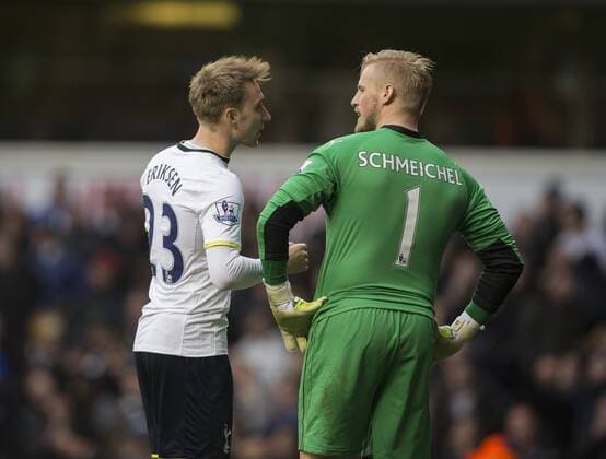 21.03.2015. London, England. Barclays Premier League. Tottenham Hotspur versus Leicester. Tottenham Hotspur s Christian Eriksen has a word with Leicester City s Kasper Schmeichel after the own goal. xNigelxCookex  ActionPlus11607017