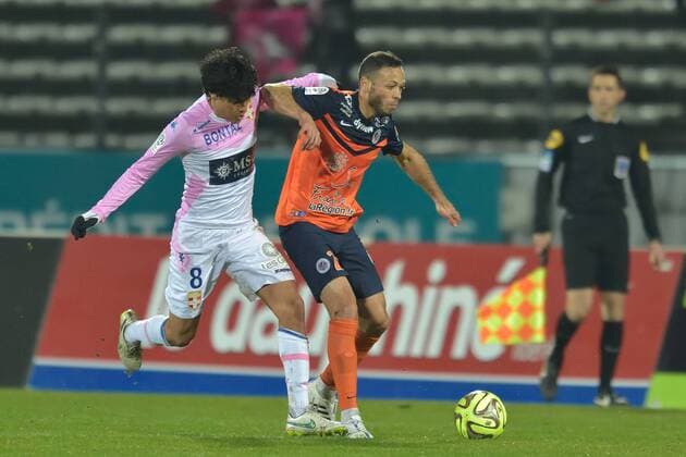 Yeltsin Tejeda (etg) vs Jamel Saidi (montpelllier) FOOTBALL : Evian Thonon Gaillard vs Montpellier - Ligue 1 - 21 03 2015 FredericChambert Panoramic 