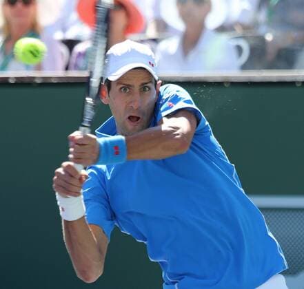 Novak Djokovic of Serbia hits a shot during his men s semifinal match at the BNP Paribas Open in Indian Wells, California on March 21, 2015.  IDW20150321703 DAVIDxSILPA