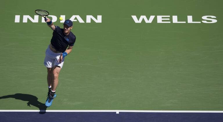 Andy Murray of Britain serves the ball during the men s semifinal match on the BNP Paribas Open tennis at the Indian Wells Tennis Garden in Indian Wells, California, the United States on March 21, 2015. (SP)US-INDIAN WELLS-TENNIS-BNP PARIBAS OPEN-MURRAY YangxLeiC 