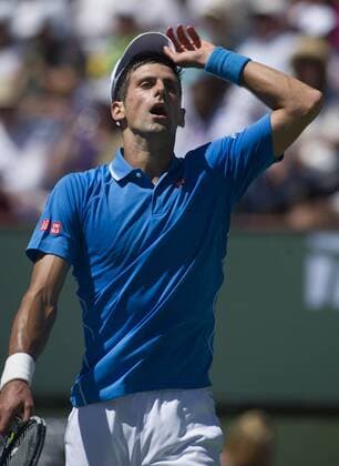Novak Djokovic of Serbia reacts during the men s semifinal match on the BNP Paribas Open tennis at the Indian Wells Tennis Garden in Indian Wells, California, the United States on March 21, 2015. (SP)US-INDIAN WELLS-TENNIS-BNP PARIBAS OPEN-DJOKOVIC YangxLeic 
