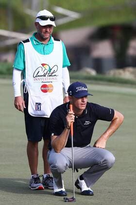 March 21, 2015 - Orlando, Florida, United States - Morgan Hoffmann (bottom) and his caddie Steve Underwood line up a putt on the 18th green during the third round of the Arnold Palmer Invitational presented by MasterCard at Bay Hill Club & Lodge. PGA Golf Herren 2015 - Arnold Palmer Invitational Presented by MasterCard - Third Round - ZUMAw109