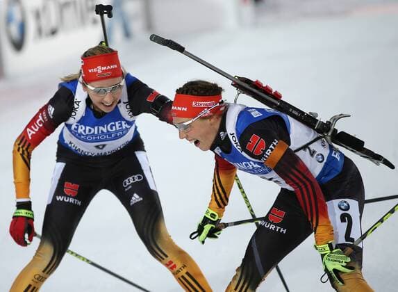 KHANTY-MANSIYSK, RUSSIA. MARCH 21, 2015. Biathletes Franziska Preuss (L) and Laura Dahlmeier of Germany seen after the women s 10 km pursuit at the 2014 15 Season IBU Biathlon World Cup stage in Khanty-Mansiysk, Russia. Evgeny Russkikh TASS  RE15F1E2