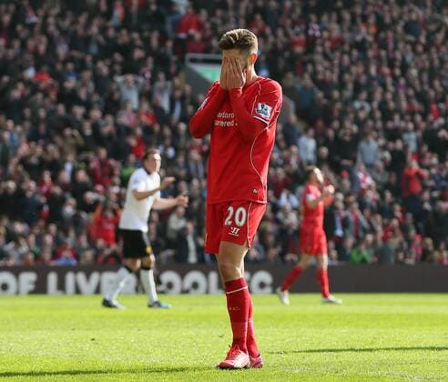 Adam Lallana of Liverpool reacts after missing a chance to score - Barclays Premier League - Liverpool vs Manchester Utd - Anfield Stadium - Liverpool - England - 22nd March 2015 - Picture Simon Bellis Sportimage EDITORIAL USE ONLY. No use with unauthorised audio, video, data, fixture lists, club league logos or live services. Online in-match use limited to 120 images, no video emulation. No use in betting, games or single club league player publications.