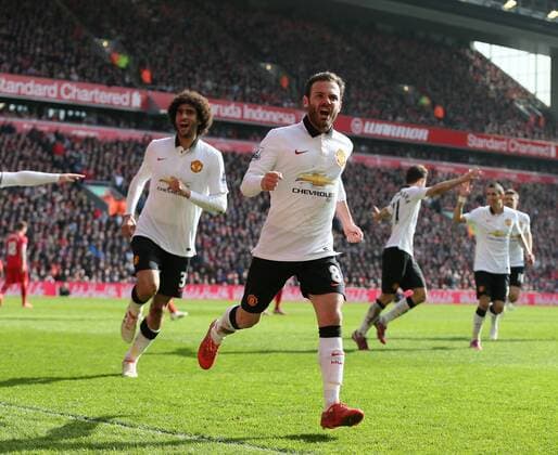 Juan Mata of Manchester United ManU celebrates his spectacular second goal - Barclays Premier League - Liverpool vs Manchester Utd - Anfield Stadium - Liverpool - England - 22nd March 2015 - Picture Simon Bellis Sportimage EDITORIAL USE ONLY. No use with unauthorised audio, video, data, fixture lists, club league logos or live services. Online in-match use limited to 120 images, no video emulation. No use in betting, games or single club league player publications.