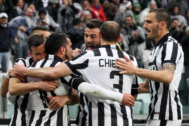 March 22, 2015 - Turin, Italy - Juventus forward Carlos Tevez (10) celebrates with his teammates after scoring his goal during the Serie A football match n.28 JUVENTUS - GENOA on 22 03 15 at the Juventus Stadium in Turin, Italy. Copyright 2015 Ã‚Â© Matteo Bottanelli Serie A: Juventus -Genoa  - ZUMAn230
