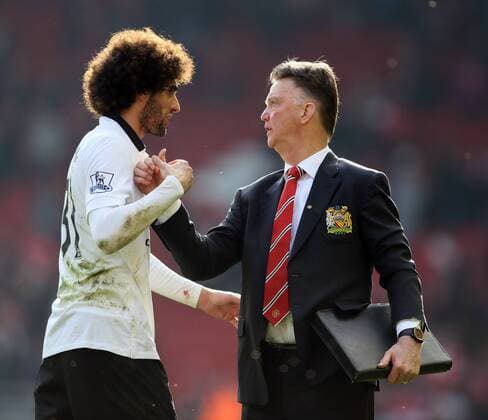 Louis van Gaal manager of Manchester United ManU thanks Mauroane Fellaini of Manchester United - Barclays Premier League - Liverpool vs Manchester Utd - Anfield Stadium - Liverpool - England - 22nd March 2015 - Picture Simon Bellis Sportimage EDITORIAL USE ONLY. No use with unauthorised audio, video, data, fixture lists, club league logos or live services. Online in-match use limited to 120 images, no video emulation. No use in betting, games or single club league player publications.