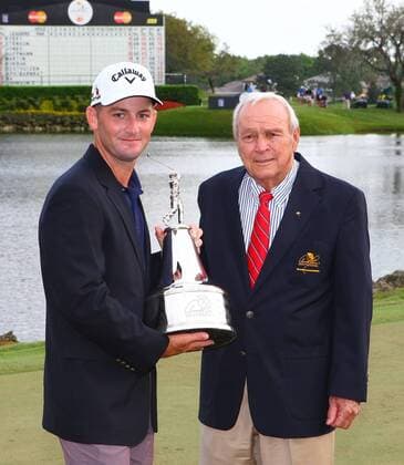 March 22 2015: Arnold Palmer presents Mat Every with the Championship trophy in the final round of the Arnold Palmer Invitational at the Bay Hill Club and Lodge in Orlando, Florida. GOLF: MAR 22 PGA Golf Herren - Arnold Palmer Invitational - Final Round Icon2881503220191 EDITORIAL USE ONLY