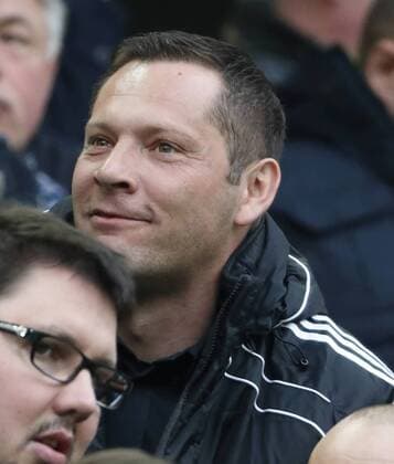 Budapest, Hungary - March 22, 2015: Pal Dardai, manager of Hertha BSC and the Hungarian national team Nationalteam wtaches Ferencvaros vs. MTK OTP Bank League football match in Groupama Arena. Budapest, Ungarn - 22. März 2015: Pal Dardai, trainer von Hertha Berlin SC und der ungarischen Nationalmannschaft besichtigt das ungarische 1. Liga Fußballmatch zwischen Ferencvaros und MTK Budapest. LaszloxSzirtesi 