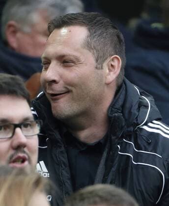 Budapest, Hungary - March 22, 2015: Pal Dardai, manager of Hertha BSC and the Hungarian national team Nationalteam wtaches Ferencvaros vs. MTK OTP Bank League football match in Groupama Arena. Budapest, Ungarn - 22. März 2015: Pal Dardai, trainer von Hertha Berlin SC und der ungarischen Nationalmannschaft besichtigt das ungarische 1. Liga Fußballmatch zwischen Ferencvaros und MTK Budapest. LaszloxSzirtesi 