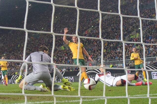 25.03.2015, xjhx, Fussball Testspiel, Deutschland - Australien, v.l. Mathew Ryan (Australien), Marco Reus (Deutsche Fussball Nationalmannschaft DFB) Goal scored, Tor zum 1:0