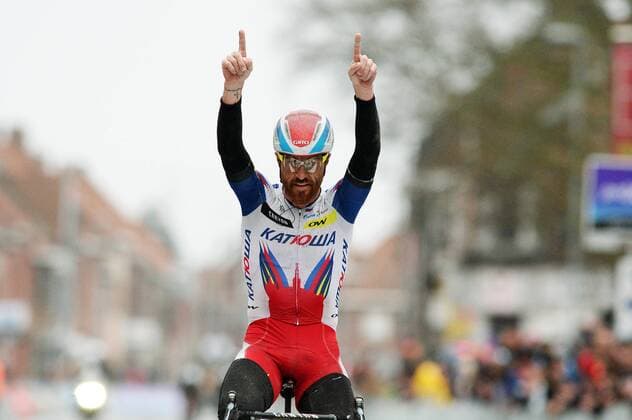 - WEVELGEM, BELGIUM: Italian Luca Paolini of Team Katusha celebrates as he crosses the finish line to win the 77th edition of the Gent-Wevelgem one day cycling race, 239 km from Deinze to Wevelgem, Sunday 29 March 2015. DAVIDxSTOCKMAN  x04595496x