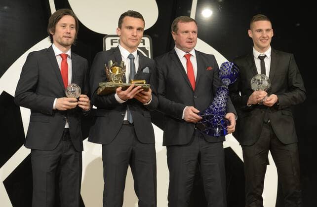 From left: Czech players Tomas Rosicky and David Lafata, coach of Czech national soccer team Pavel Vrba and Pavel Kaderabek pose with awards during the Czech Footballer of the Year for 2014 ceremony, organised by the Czech Football Association (FACR) in Prague, Czech Republic, March 29, 2015. (CTKxPhoto MichalxKrumphanzl) CTKPhotoP201503290525501  _KRU6653