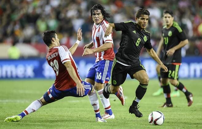 March 31, 2015 - Kansas City, MO, USA - Mexico midfielder Jonathan Dos Santos, (8) breaks past the defense of Paraguay s Fabian Balbuena (19) in the first half during a friendly on Tuesday, March 31, 2015, at Arrowhead Stadium in Kansas City, Mo. Paraguay vs. Mexico - ZUMAm67_