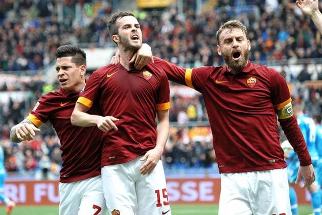 Miralem Pjanic (C) , Juan Manuel Iturbe (L) e Daniele De Rossi (R) Goal celebration Roma 04-04-2015 Stadio Olimpico, Football Calcio Serie A AS Rom vs SSC Neapel andreaxstaccioli