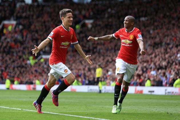 Ander Herrera of Manchester United ManU celebrates scoring the opening goal - Manchester United vs. Aston Villa - Barclay s Premier League - Old Trafford - Manchester - 04 04 2015 Pic Philip Oldham Sportimage EDITORIAL USE ONLY. No use with unauthorised audio, video, data, fixture lists, club league logos or live services. Online in-match use limited to 120 images, no video emulation. No use in betting, games or single club league player publications.