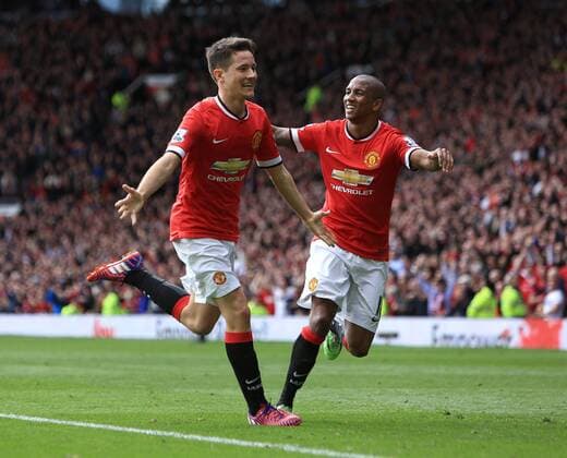 Ander Herrera of Manchester United ManU celebrates scoring the opening goal - Manchester United vs. Aston Villa - Barclay s Premier League - Old Trafford - Manchester - 04 04 2015 Pic Philip Oldham Sportimage EDITORIAL USE ONLY. No use with unauthorised audio, video, data, fixture lists, club league logos or live services. Online in-match use limited to 120 images, no video emulation. No use in betting, games or single club league player publications.