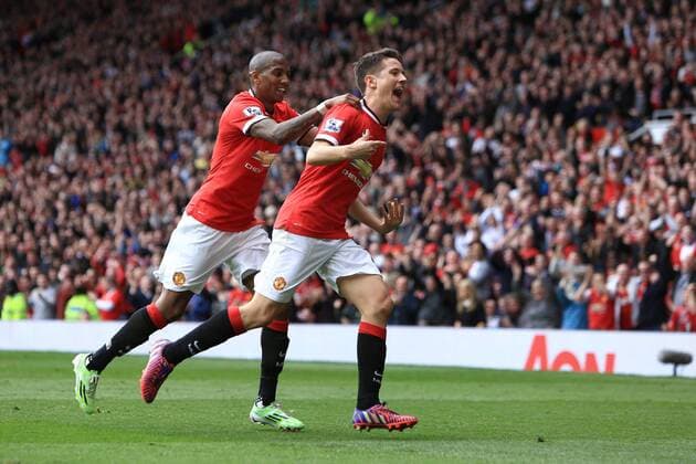 Ander Herrera of Manchester United ManU celebrates scoring the opening goal - Manchester United vs. Aston Villa - Barclay s Premier League - Old Trafford - Manchester - 04 04 2015 Pic Philip Oldham Sportimage EDITORIAL USE ONLY. No use with unauthorised audio, video, data, fixture lists, club league logos or live services. Online in-match use limited to 120 images, no video emulation. No use in betting, games or single club league player publications.