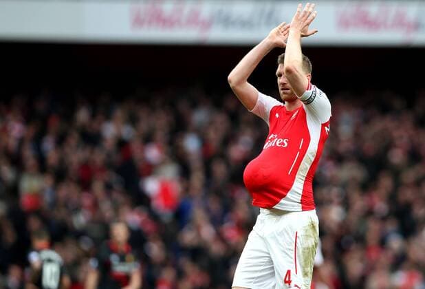 Per Mertesacker of Arsenal gestures after the Barclays Premier League match between Arsenal and Liverpool at the Emirates Stadium in London, England on April 4, 2015. Arsenal won 4-1. ) FOR EDITORIAL USE ONLY. NOT FOR SALE FOR MARKETING OR ADVERTISING CAMPAIGNS. NO USE WITH UNAUTHORIZED AUDIO, VIDEO, DATA, FIXTURE LISTS, CLUB LEAGUE LOGOS OR LIVE SERVICES. ONLINE IN-MATCH USE LIMITED TO 45 IMAGES, NO VIDEO EMULATION. NO USE IN BETTING, GAMES OR SINGLE CLUB LEAGUE PLAYER PUBLICATIONS.? (SP)UK-LONDON-SOCCER-BARCLAYS PREMIER LEAGUE-ARSENAL VS LIVERPOOL HanxYan 