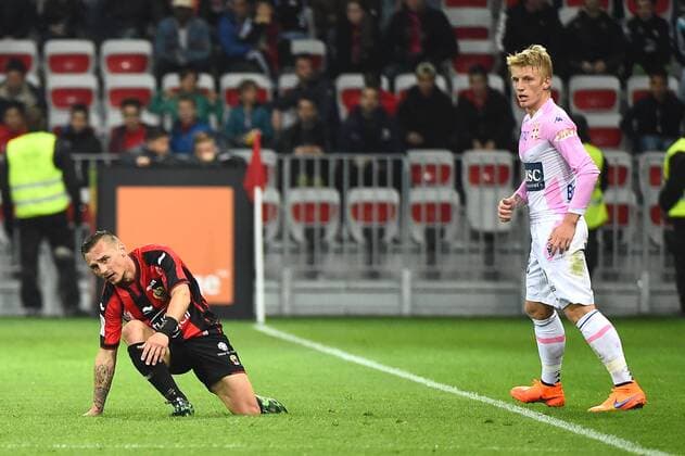 ERIC BAUTHEAC (nice) - Daniel WASS (evi) FOOTBALL : Nice vs Evian Thonon Gaillard - Ligue 1 - 04 04 2015 FEP Panoramic 
