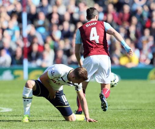 Harry Kane of Tottenham holds his groin - Barclays Premier League - Burnley vs Tottenham - Turf Moor Stadium - Burnley - England - 5th April 2015 - Picture Simon Bellis Sportimage EDITORIAL USE ONLY. No use with unauthorised audio, video, data, fixture lists, club league logos or live services. Online in-match use limited to 120 images, no video emulation. No use in betting, games or single club league player publications.
