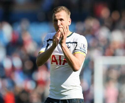 Harry Kane of Tottenham applauds the travelling fans after his first game as captain - Barclays Premier League - Burnley vs Tottenham - Turf Moor Stadium - Burnley - England - 5th April 2015 - Picture Simon Bellis Sportimage EDITORIAL USE ONLY. No use with unauthorised audio, video, data, fixture lists, club league logos or live services. Online in-match use limited to 120 images, no video emulation. No use in betting, games or single club league player publications.