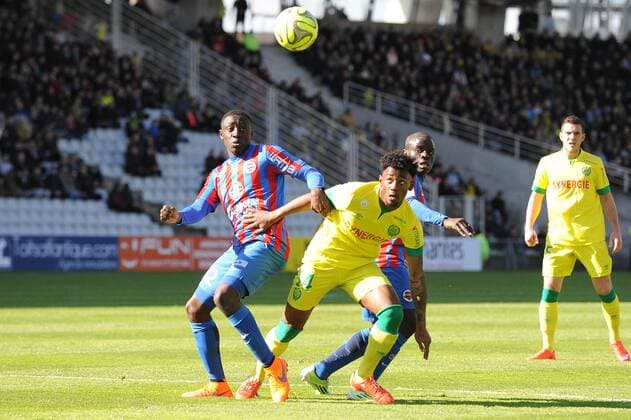 Georges Kevin Nkoudou (Nantes) Dennis Appiah (Caen) FOOTBALL : Nantes vs Caen - Ligue 1 - 05 04 2015 N.LeGouic FEP Panoramic 