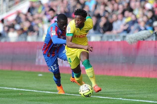 Georges Kevin Nkoudou (Nantes) Dennis Appiah (Caen) FOOTBALL : Nantes vs Caen - Ligue 1 - 05 04 2015 N.LeGouic FEP Panoramic 
