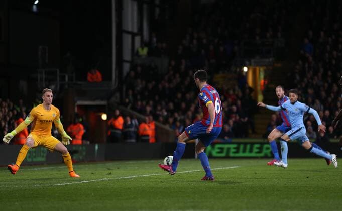 Manchester City s Joe Hart fails to stop Crystal Palace s Scott Dann s shot leading to Glenn Murray s opening goal Barclays Premier League- Crystal Palace vs Manchester City - Selhurst Park - England - 6th April 2015 - Picture David Klein Sportimage EDITORIAL USE ONLY. No use with unauthorised audio, video, data, fixture lists, club league logos or live services. Online in-match use limited to 120 images, no video emulation. No use in betting, games or single club league player publications.